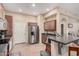 Spacious kitchen with stainless steel appliances, plenty of cabinets, and tiled flooring at 14575 W Mountain View Blvd # 12309, Surprise, AZ 85374