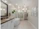 Stylish bathroom featuring a soaking tub, tiled shower, and modern fixtures at 14759 W Alexandria Way, Surprise, AZ 85379