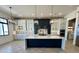 Modern kitchen with a large island, stainless steel appliances, and beautiful backsplash tile at 1650 W Lucky Ln, Queen Creek, AZ 85144