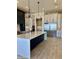 Spacious kitchen with stainless steel appliances, island, and a combination of light and dark cabinetry at 1650 W Lucky Ln, Queen Creek, AZ 85144