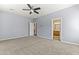 Spacious bedroom leading to bathroom at 16762 W Sonora St, Goodyear, AZ 85338