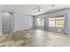 Expansive living area with tile flooring, neutral color palette, and plenty of natural light at 16762 W Sonora St, Goodyear, AZ 85338