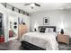 Bedroom with neutral gray walls and decor, ceiling fan, and carpeted floors at 16821 S 23Rd St, Phoenix, AZ 85048