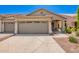 Charming single-story home featuring a two-car garage, landscaped yard, and covered entryway at 16821 S 23Rd St, Phoenix, AZ 85048