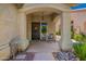 Covered front porch featuring decorative elements, providing a welcoming entrance to the home at 16821 S 23Rd St, Phoenix, AZ 85048