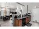 Kitchen with wood cabinets and views to the living and dining rooms at 16821 S 23Rd St, Phoenix, AZ 85048
