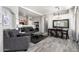 Spacious open-concept living area featuring a modern design, seamlessly connecting to the dining area at 16821 S 23Rd St, Phoenix, AZ 85048