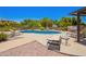 Community pool with comfortable lounge chairs at 16821 S 23Rd St, Phoenix, AZ 85048