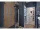 Contemporary bathroom featuring a glass-enclosed shower and access to walk-in closet at 1694 E Dogwood Ln, Gilbert, AZ 85295