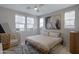 Serene bedroom with soft lighting, a neutral color palette, and a cozy rug at 1694 E Dogwood Ln, Gilbert, AZ 85295