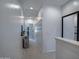 Bright hallway with carpet flooring and white walls at 1694 E Dogwood Ln, Gilbert, AZ 85295