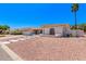 A beautiful single-Gathering home showcasing desert landscaping, a red tile roof, and white exterior at 17025 E De Anza Dr, Fountain Hills, AZ 85268