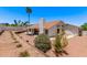Charming home featuring a terracotta tile roof and landscaped backyard at 17025 E De Anza Dr, Fountain Hills, AZ 85268