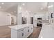 Stylish kitchen with a large island, white cabinetry, and stainless steel appliances at 17025 E De Anza Dr, Fountain Hills, AZ 85268
