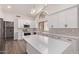 Modern kitchen featuring a large island, quartz countertops, and stainless steel appliances at 17025 E De Anza Dr, Fountain Hills, AZ 85268