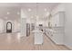 Bright kitchen with white cabinets, stainless steel appliances, and a center island at 17025 E De Anza Dr, Fountain Hills, AZ 85268