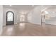 Spacious living room with hardwood floors, high ceilings, a chandelier, and plenty of natural light at 17025 E De Anza Dr, Fountain Hills, AZ 85268