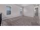 Upstairs bonus room with multiple windows, neutral walls and gray carpet at 17118 N 50Th Way, Scottsdale, AZ 85254