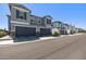 View of well-built homes with neat landscaping on a sunny street at 17118 N 50Th Way, Scottsdale, AZ 85254