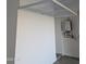 A spacious garage with installed shelving and a modern water heater for efficient storage and convenience at 17118 N 50Th Way, Scottsdale, AZ 85254