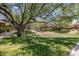 A community park features mature trees and grass creating an ideal setting for leisurely outdoor enjoyment at 1720 W Aloe Vera Dr, Phoenix, AZ 85085