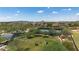 Aerial view of dog park and playground surrounded by desert landscaping with mountain views at 1720 W Aloe Vera Dr, Phoenix, AZ 85085