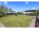 Fully fenced community dog park featuring green grass and covered picnic seating at 1720 W Aloe Vera Dr, Phoenix, AZ 85085