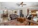 Spacious living room with an open layout, seamlessly connecting to the dining area and kitchen, ideal for entertaining at 1720 W Aloe Vera Dr, Phoenix, AZ 85085