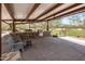 Outdoor kitchen with stone countertops and a built-in grill at 1720 W Aloe Vera Dr, Phoenix, AZ 85085