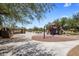Community playground featuring climbing wall, swings, slides, and picnic area at 1720 W Aloe Vera Dr, Phoenix, AZ 85085