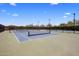 Community tennis courts with full fencing and lighting for nighttime play at 1720 W Aloe Vera Dr, Phoenix, AZ 85085