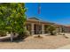 Charming single-story home featuring a neutral color scheme and a well-maintained xeriscaped front yard at 17796 W Andora St, Surprise, AZ 85388