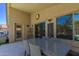Covered patio with an outdoor dining area, seamlessly blending indoor and outdoor spaces at 17796 W Andora St, Surprise, AZ 85388