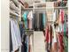 Spacious walk-in closet with organized shelving and ample storage for clothes, accessories, and luggage at 17796 W Andora St, Surprise, AZ 85388