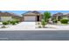 A street view of attractive single-Gathering homes showcasing well-maintained landscaping and curb appeal at 18027 W Tina Ln, Surprise, AZ 85387