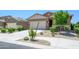 Charming single-Gathering home with a well-maintained front yard and attached garage, perfect for Gathering living at 18027 W Tina Ln, Surprise, AZ 85387