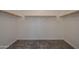 Spacious walk-in closet with built-in shelving and ample storage space at 18027 W Tina Ln, Surprise, AZ 85387