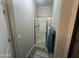 Modern bathroom featuring a glass-enclosed shower and tiled floors at 1814 W Minton St, Phoenix, AZ 85041