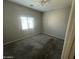 Neutral bedroom with carpet, ceiling fan, and natural light at 1814 W Minton St, Phoenix, AZ 85041
