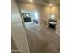 Upstairs hallway with gray carpet leading into the main bedroom at 1814 W Minton St, Phoenix, AZ 85041