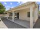 Covered back patio with concrete flooring at 19102 N 91St St, Scottsdale, AZ 85255