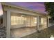 Relaxing covered patio with ceiling fan and access to the backyard at 19102 N 91St St, Scottsdale, AZ 85255