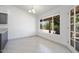 Simple dining area with tile flooring and backyard view at 19102 N 91St St, Scottsdale, AZ 85255