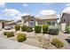 Charming single-story home with a well-manicured front yard and desert landscaping at 19102 N 91St St, Scottsdale, AZ 85255
