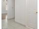 Hallway with tile floors and white trim at 19102 N 91St St, Scottsdale, AZ 85255
