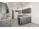 Bright kitchen with stainless steel appliances, granite countertops, and tiled floors at 19102 N 91St St, Scottsdale, AZ 85255