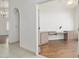 Office featuring a built in desk, hardwood floors, and natural light at 19102 N 91St St, Scottsdale, AZ 85255