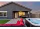 Enjoy an evening in the hot tub in this landscaped yard with BBQ and outdoor dining at 19531 W Palo Verde Dr, Litchfield Park, AZ 85340