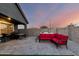 A stunning backyard with a hot tub, a spacious patio, and comfortable lounge seating at 19531 W Palo Verde Dr, Litchfield Park, AZ 85340