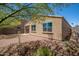 The home features desert landscaping, enhancing its appeal and reducing water use at 1965 N 213Th Dr, Buckeye, AZ 85396